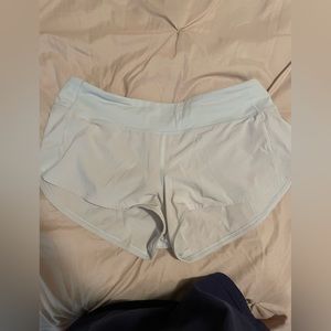 size eight lululemon speed up shorts in light blue